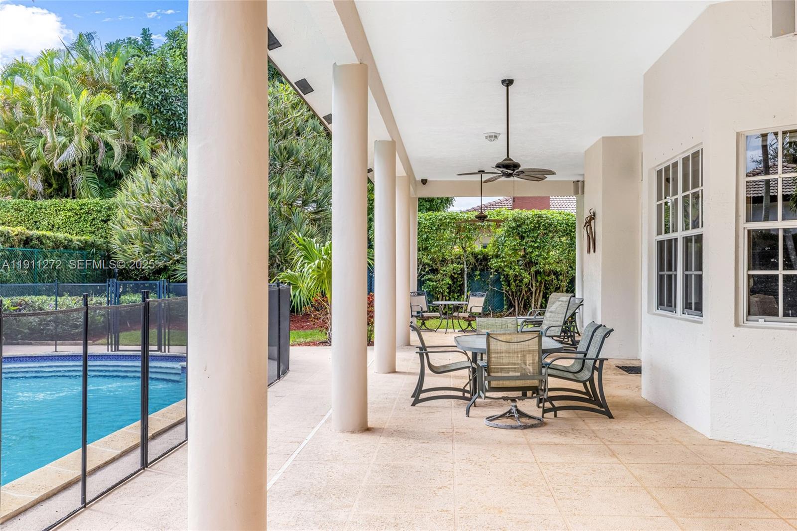 7250 Southwest 99th Street Pinecrest, FL 33156 - Photo 25 of 40 a outdoor view with a sitting space