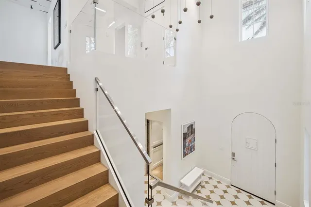 a view of staircase with white walls