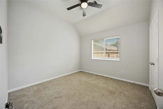 a front view of a house with swimming pool having outdoor seating