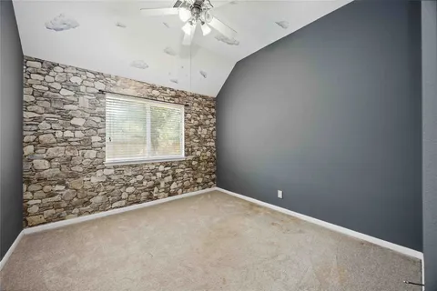 en empty room with windows