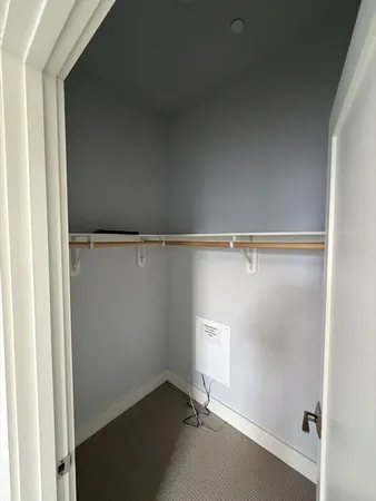 a view of a room with racks on the wall