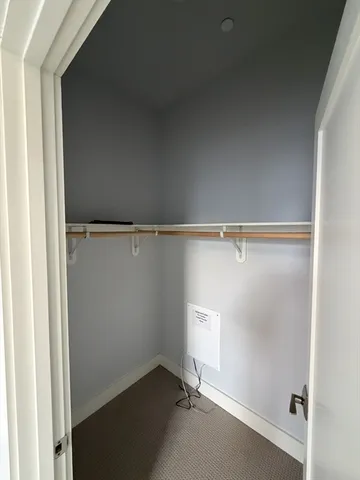 a view of a room with racks on the wall