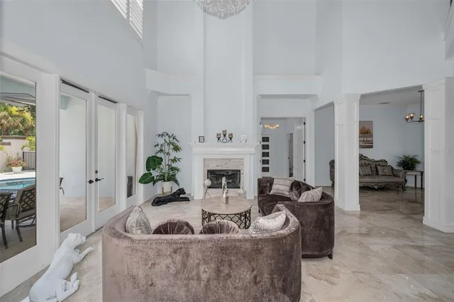 a kitchen with stainless steel appliances granite countertop a sink and a refrigerator