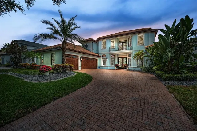 a view of a garden with flowers and trees