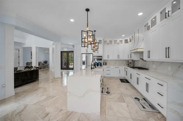 a view of a livingroom with furniture window and wooden floor