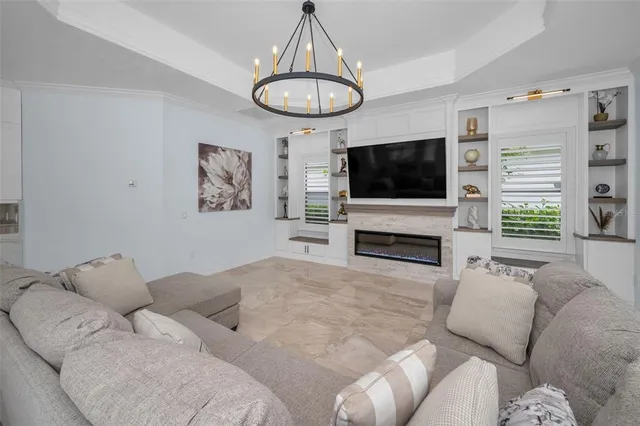 a view of balcony with wooden floor and fence