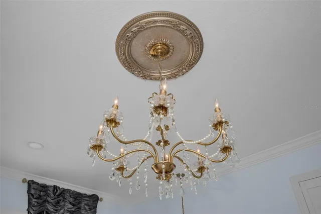 a bathroom with a sink a toilet and shower curtain