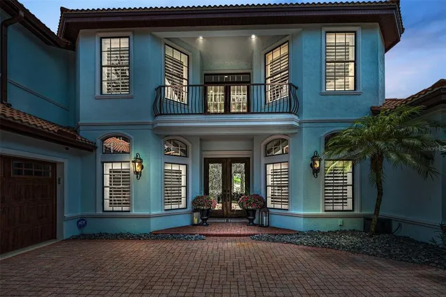 a view of a livingroom with furniture and front door
