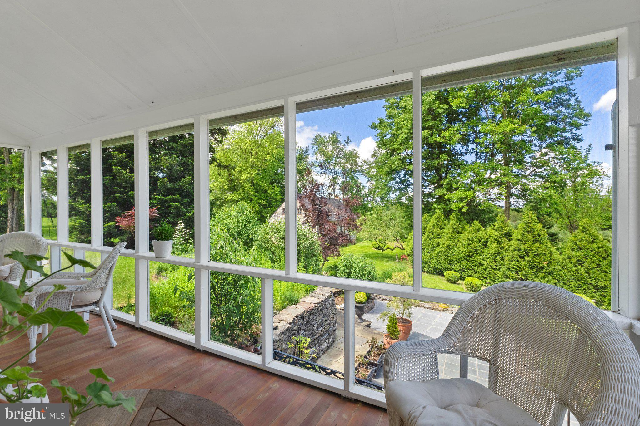 6338 Kabletown Road Charles Town, WV 25414 - Photo 42 of 113 Screened Porch off of Kitchen overlooking Gardens