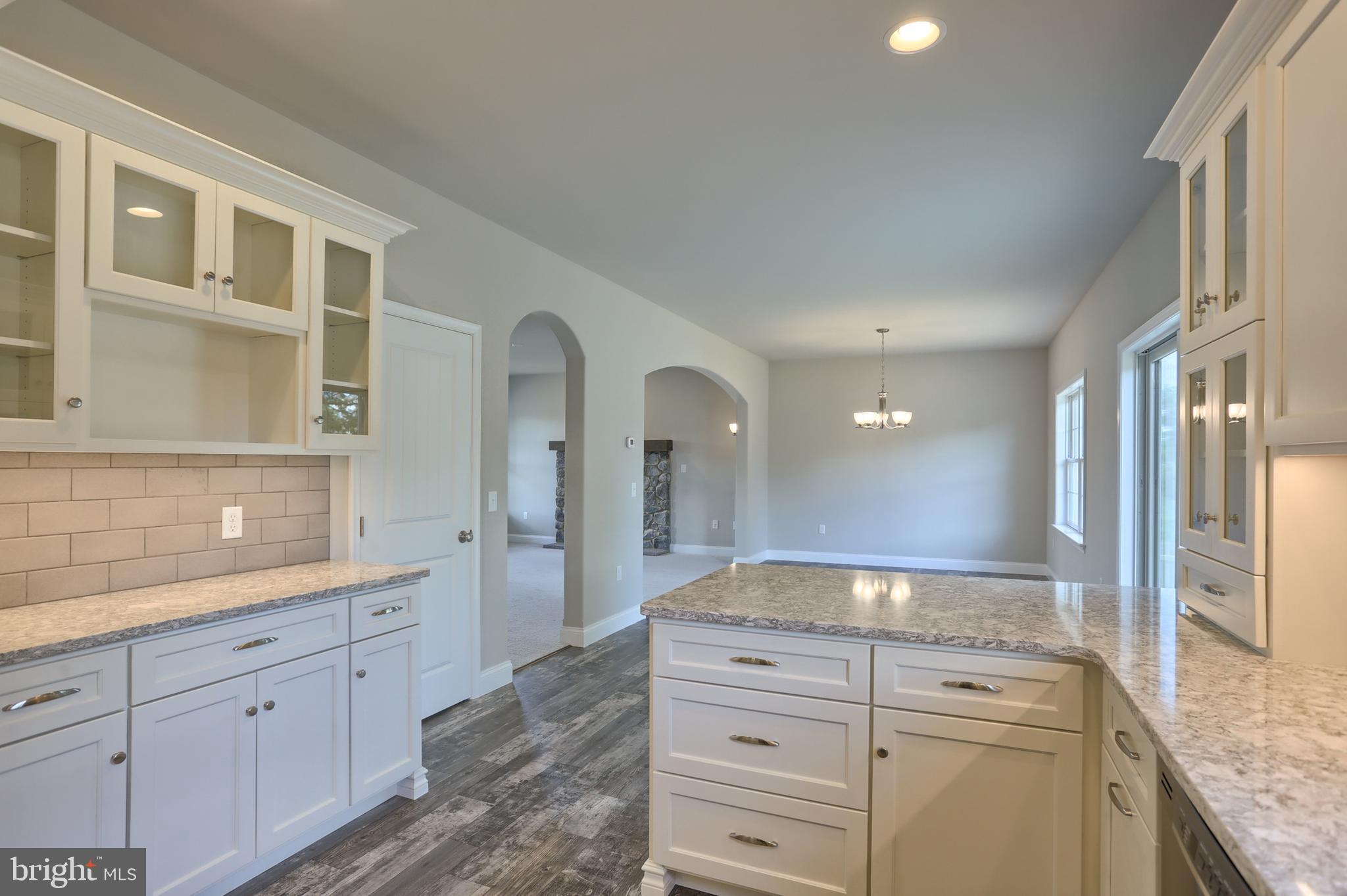 1 Rolling Meadow Road Lebanon, PA 17046 - Photo 12 of 21 a bathroom with a granite countertop double vanity sink a mirror and shower