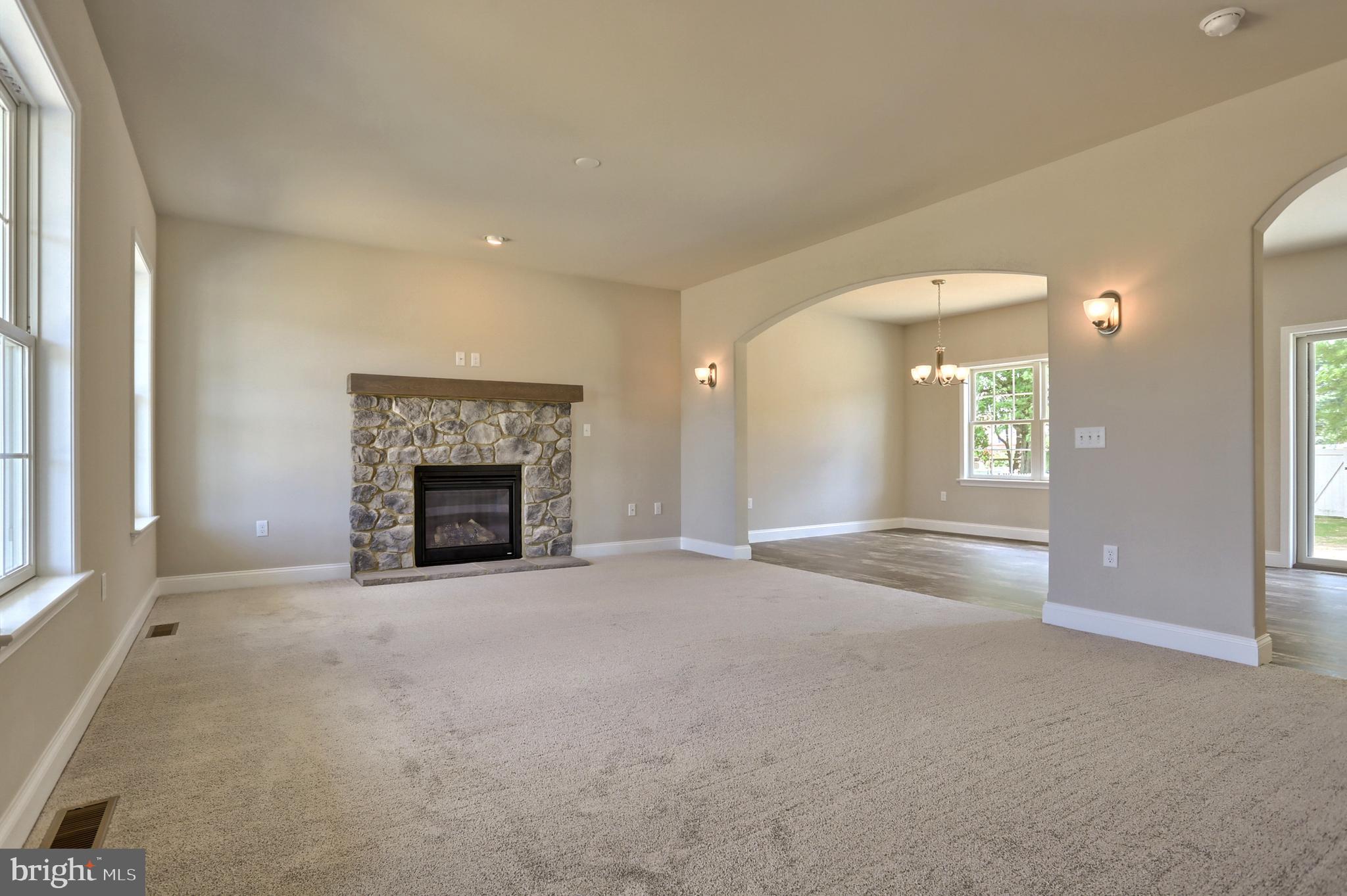 1 Rolling Meadow Road Lebanon, PA 17046 - Photo 2 of 21 an empty room with windows and fireplace