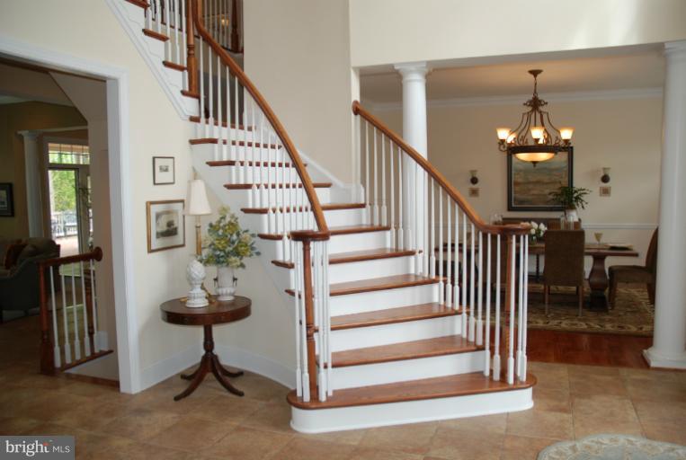 327 Reserve Gate Terrace Silver Spring, MD 20905 - Photo 24 of 28 Foyer with curved staircase