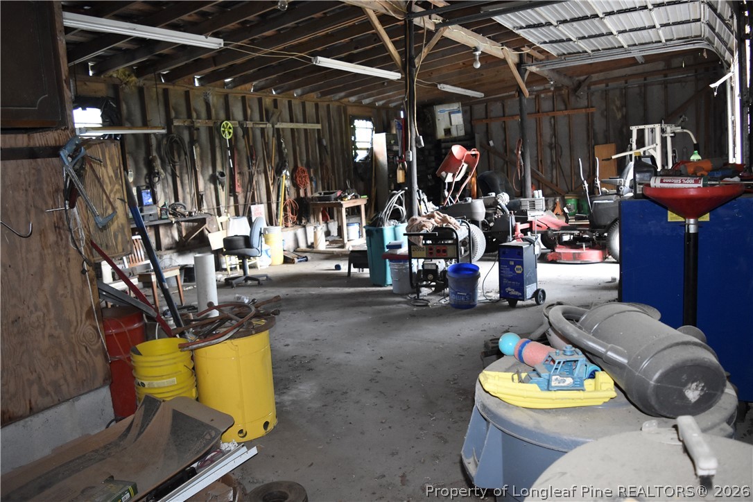 5309 Tobacco Road Orrum, NC 28369 - Photo 42 of 44 a view of a room with gym equipment