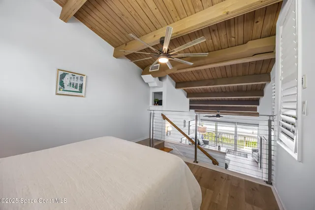 a view of a swimming pool with a yard