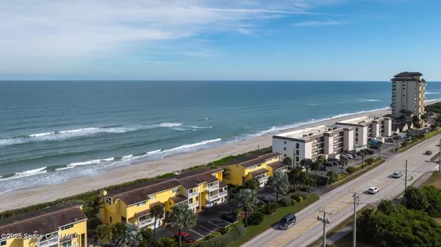 a view of residential houses with street view