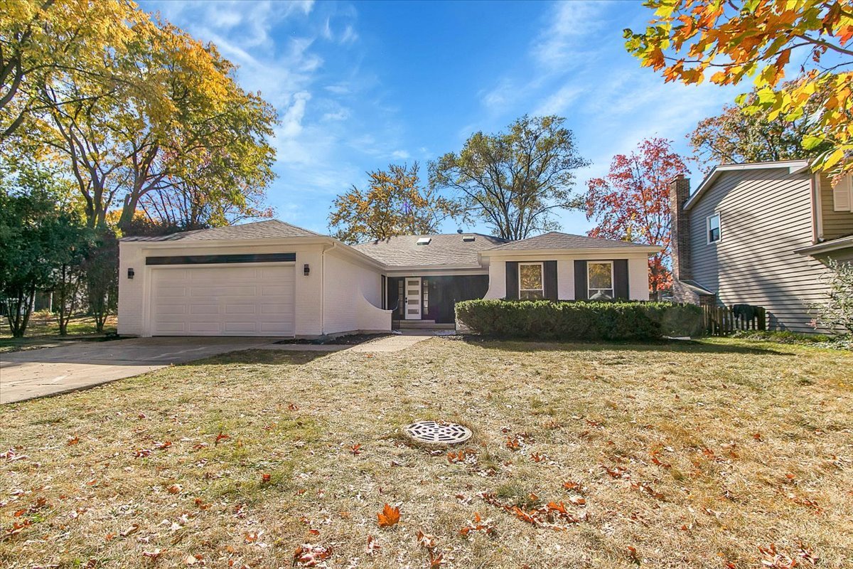 6705 Breckenridge Road Lisle, IL 60532 - Photo 1 of 41 a front view of a house with a yard