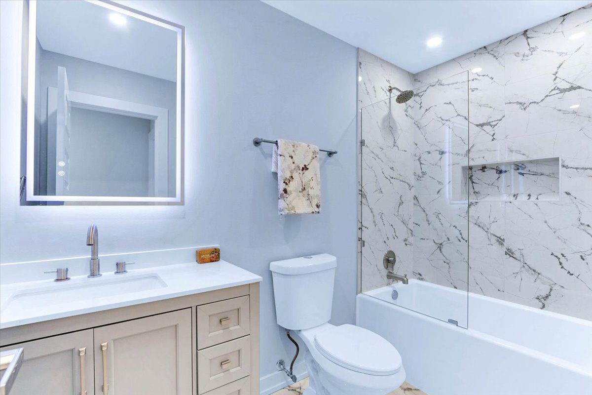 6705 Breckenridge Road Lisle, IL 60532 - Photo 11 of 41 a bathroom with a sink toilet and shower