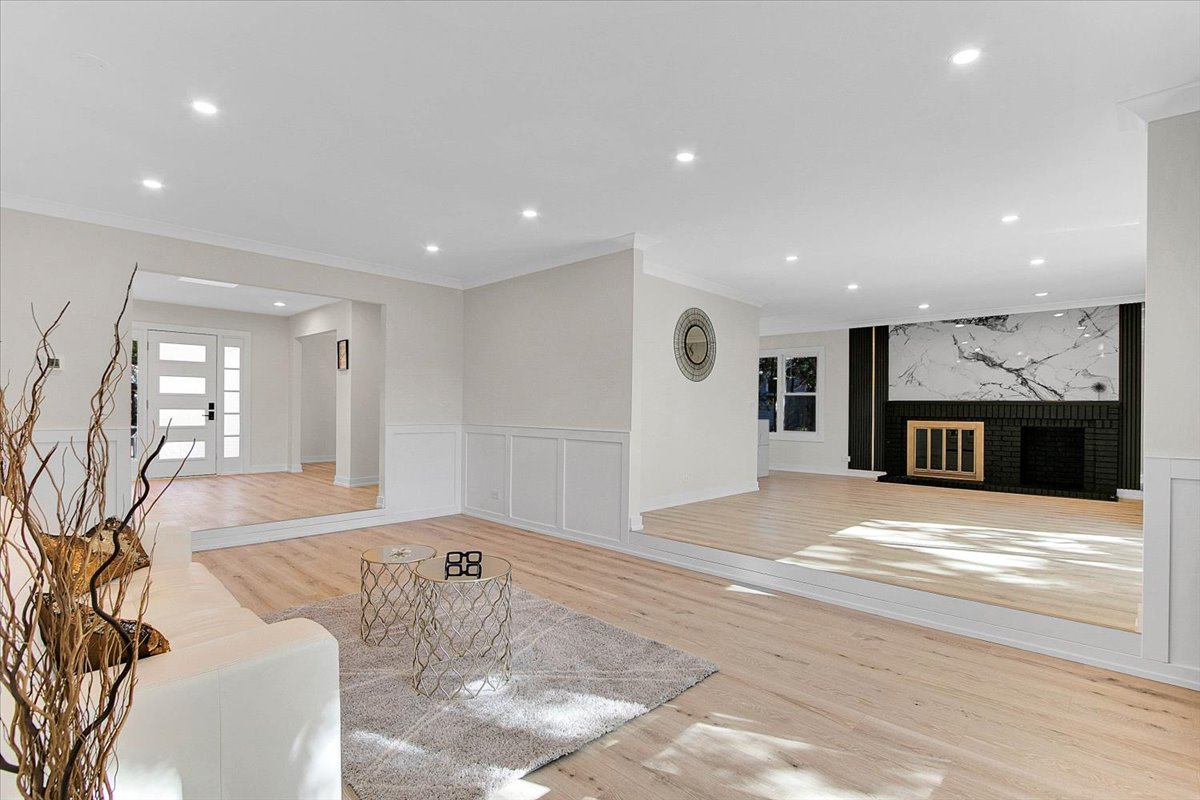 6705 Breckenridge Road Lisle, IL 60532 - Photo 25 of 41 a view of a living room and a kitchen