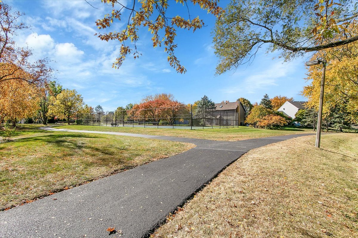 6705 Breckenridge Road Lisle, IL 60532 - Photo 38 of 41 a view of yard with swimming pool and green space
