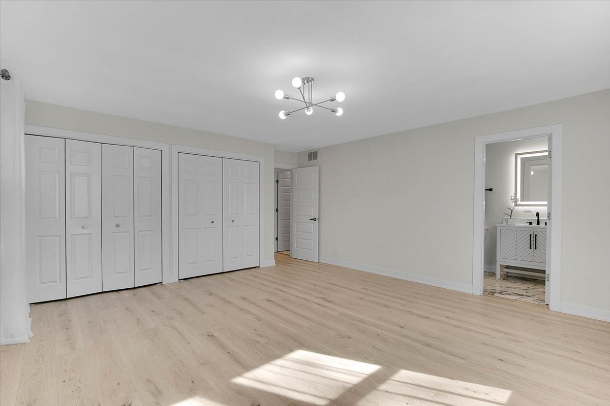 6705 Breckenridge Road Lisle, IL 60532 - Photo 4 of 41 a view of empty room with wooden floor and ceiling fan