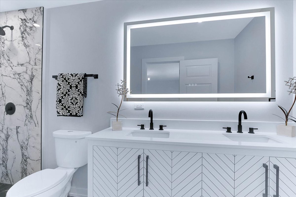 6705 Breckenridge Road Lisle, IL 60532 - Photo 5 of 41 a bathroom with a sink a toilet and mirror