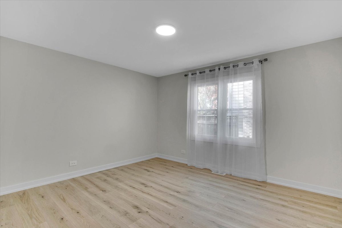 6705 Breckenridge Road Lisle, IL 60532 - Photo 7 of 41 wooden floor in an empty room