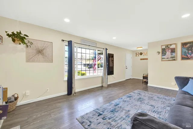 a kitchen with a stove a sink and a refrigerator