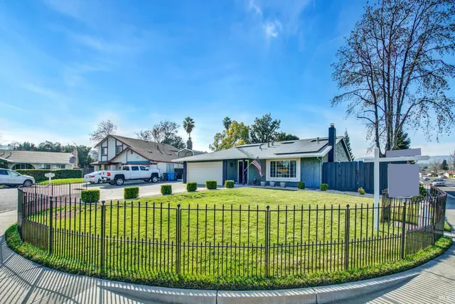 a view of a house with a big yard