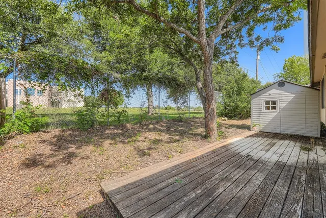 a view of backyard with green space