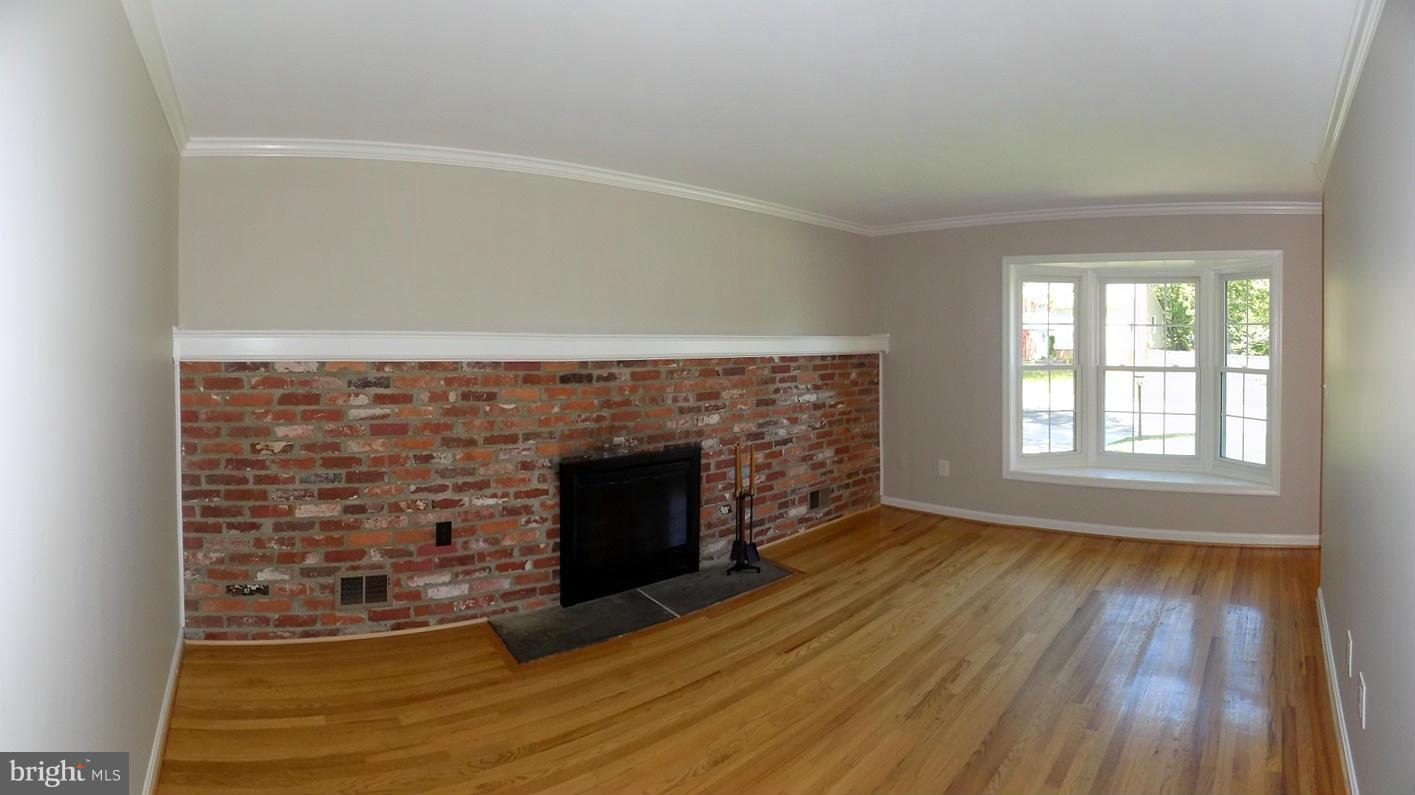 8403 Margate Road Upper Marlboro, MD 20772 - Photo 3 of 30 Family Room with Brick Fireplace