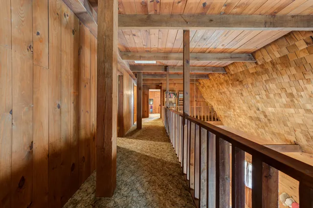 a bathroom with a toilet a sink and shower