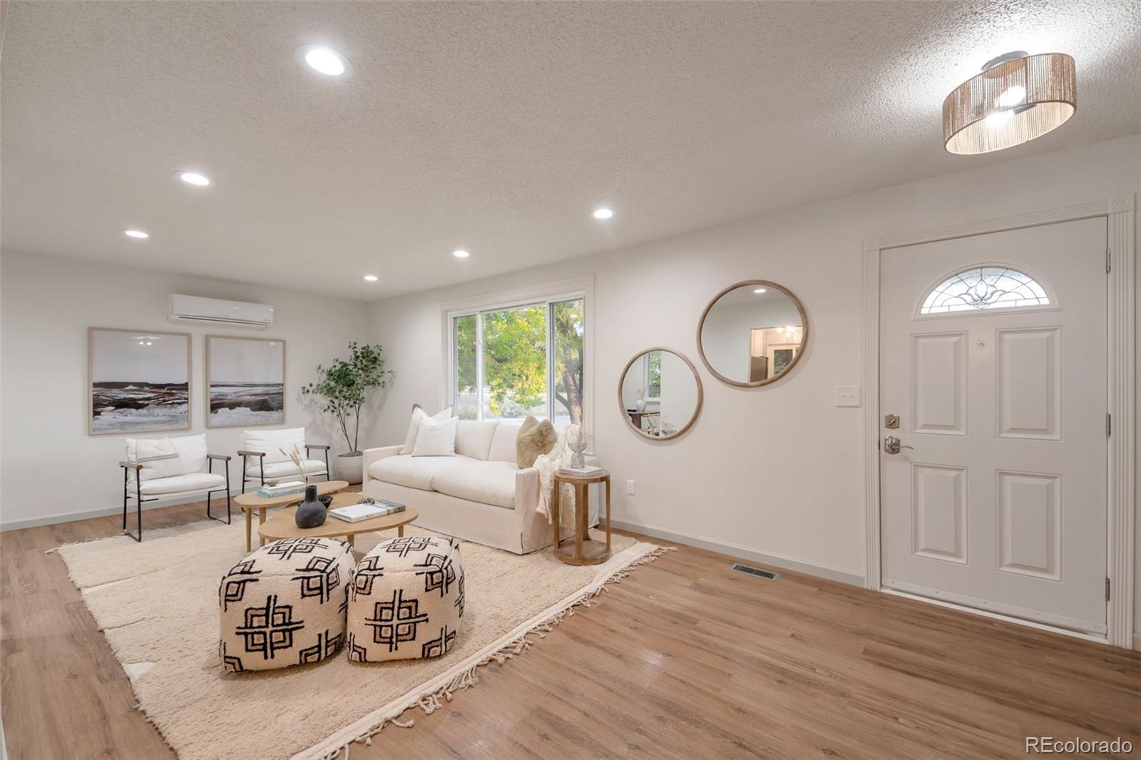7891 Durham Way Boulder, CO 80301 - Photo 4 of 18 a living room with furniture and a window