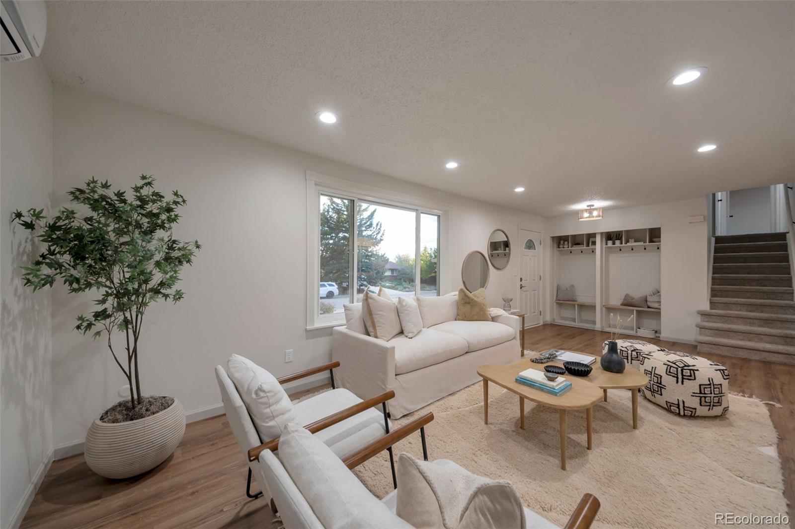 7891 Durham Way Boulder, CO 80301 - Photo 5 of 18 a living room with furniture and a potted plant