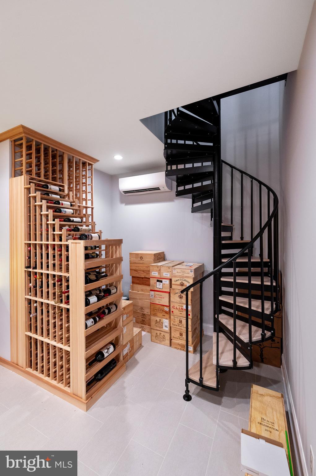 431 Boxwood Road Bryn Mawr, PA 19010 - Photo 11 of 83 Spiral staircase connect Bar Room to wine cellar