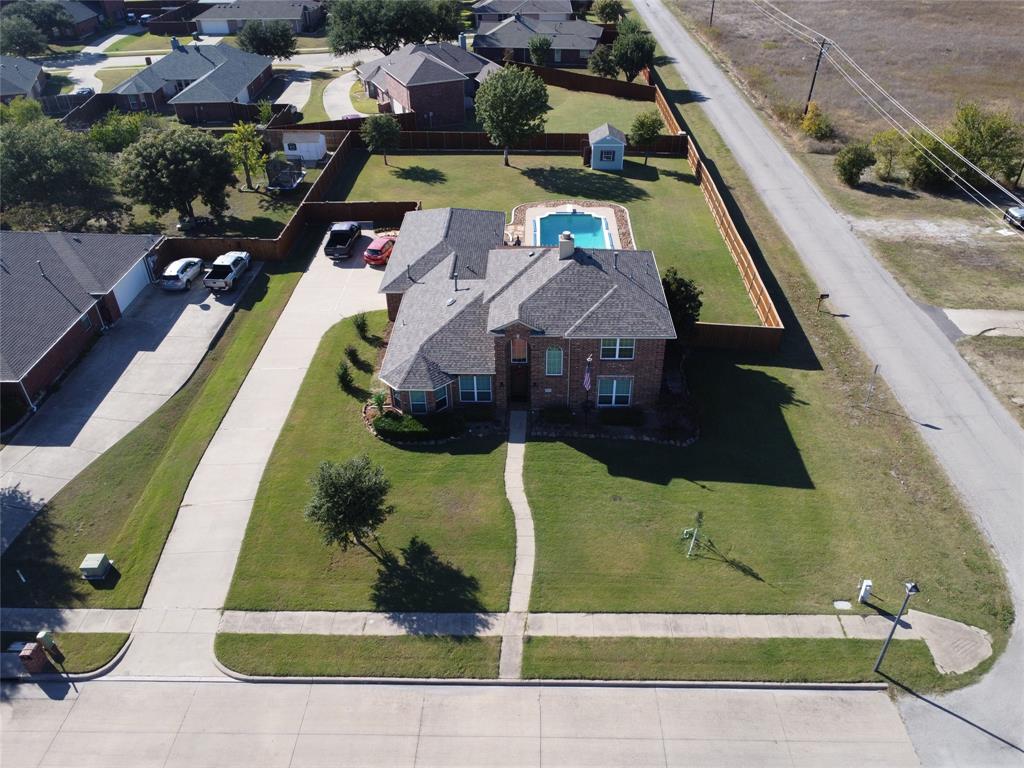 1413 Rodeo Drive Murphy, TX 75094 - Photo 2 of 29 an aerial view of a house with swimming pool