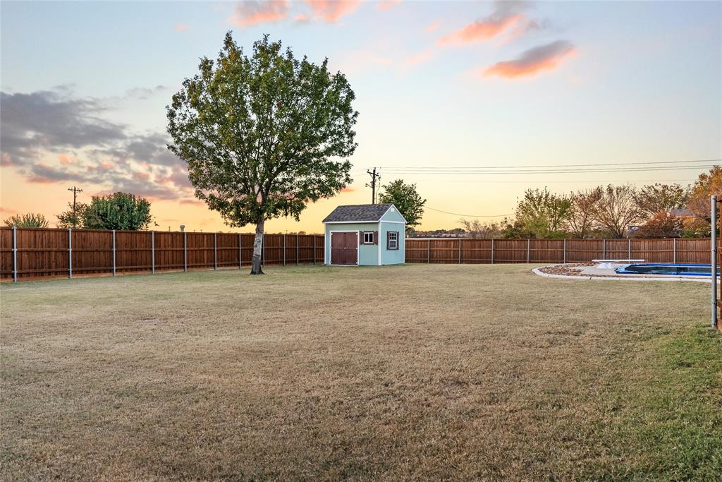 1413 Rodeo Drive Murphy, TX 75094 - Photo 22 of 29 a view of a backyard