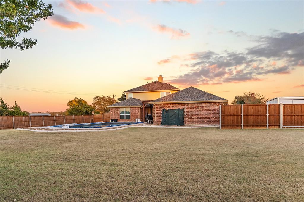 1413 Rodeo Drive Murphy, TX 75094 - Photo 23 of 29 a view of a houses with a yard
