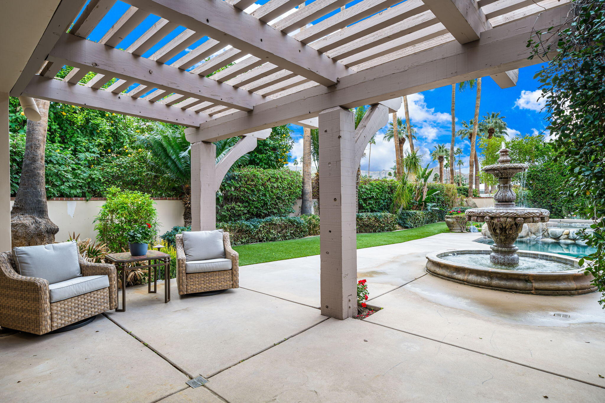 45595 Apache Road Indian Wells, CA 92210 - Photo 42 of 58 a outdoor living space with furniture and garden view