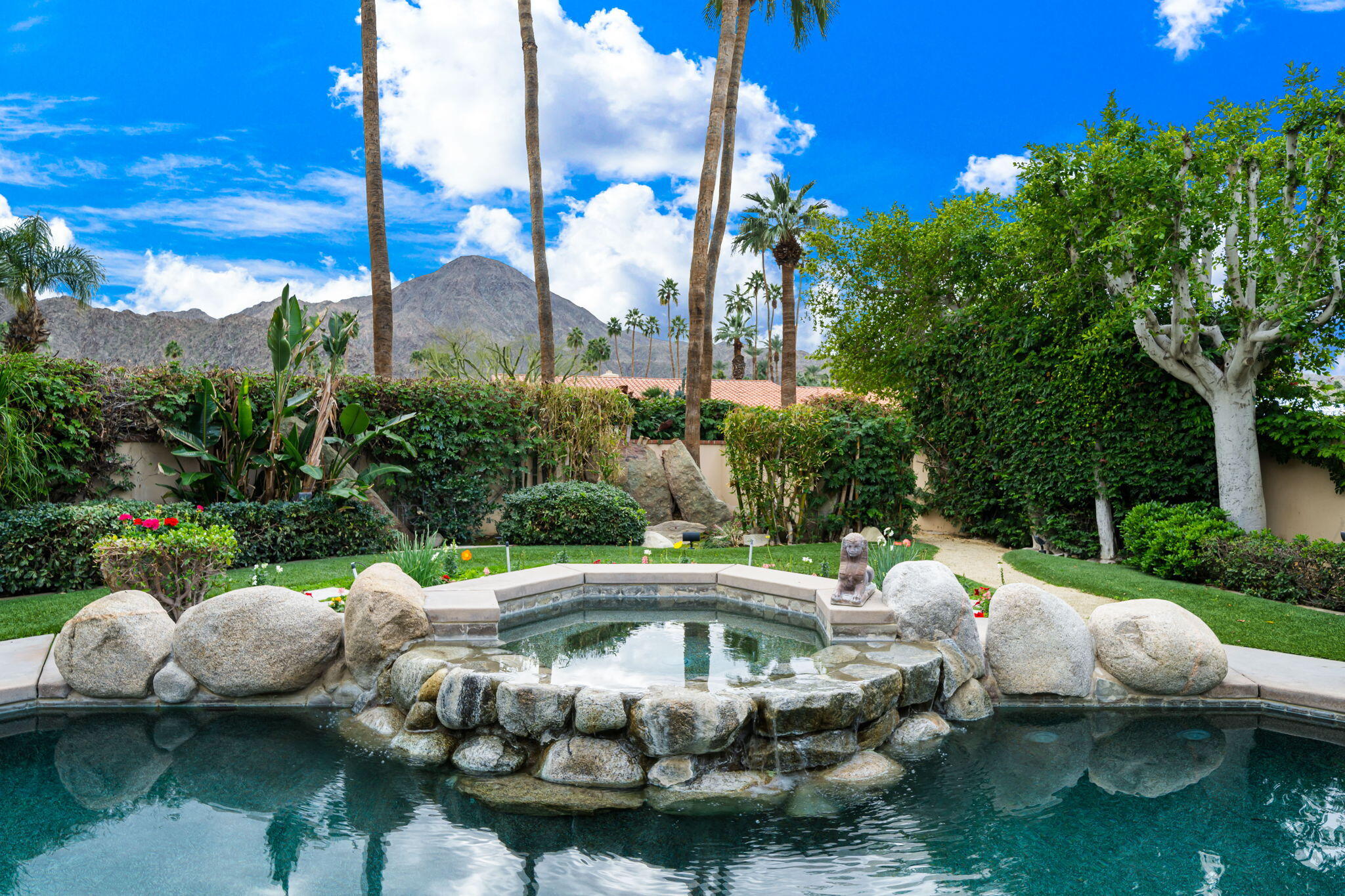 45595 Apache Road Indian Wells, CA 92210 - Photo 43 of 58 a front view of a lake with lots of green space