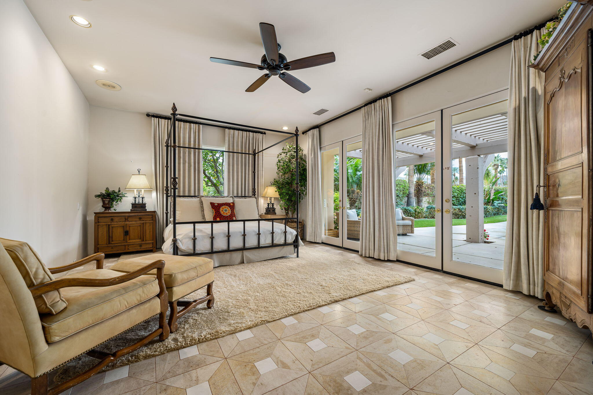 45595 Apache Road Indian Wells, CA 92210 - Photo 44 of 58 a living room with furniture and a ceiling fan