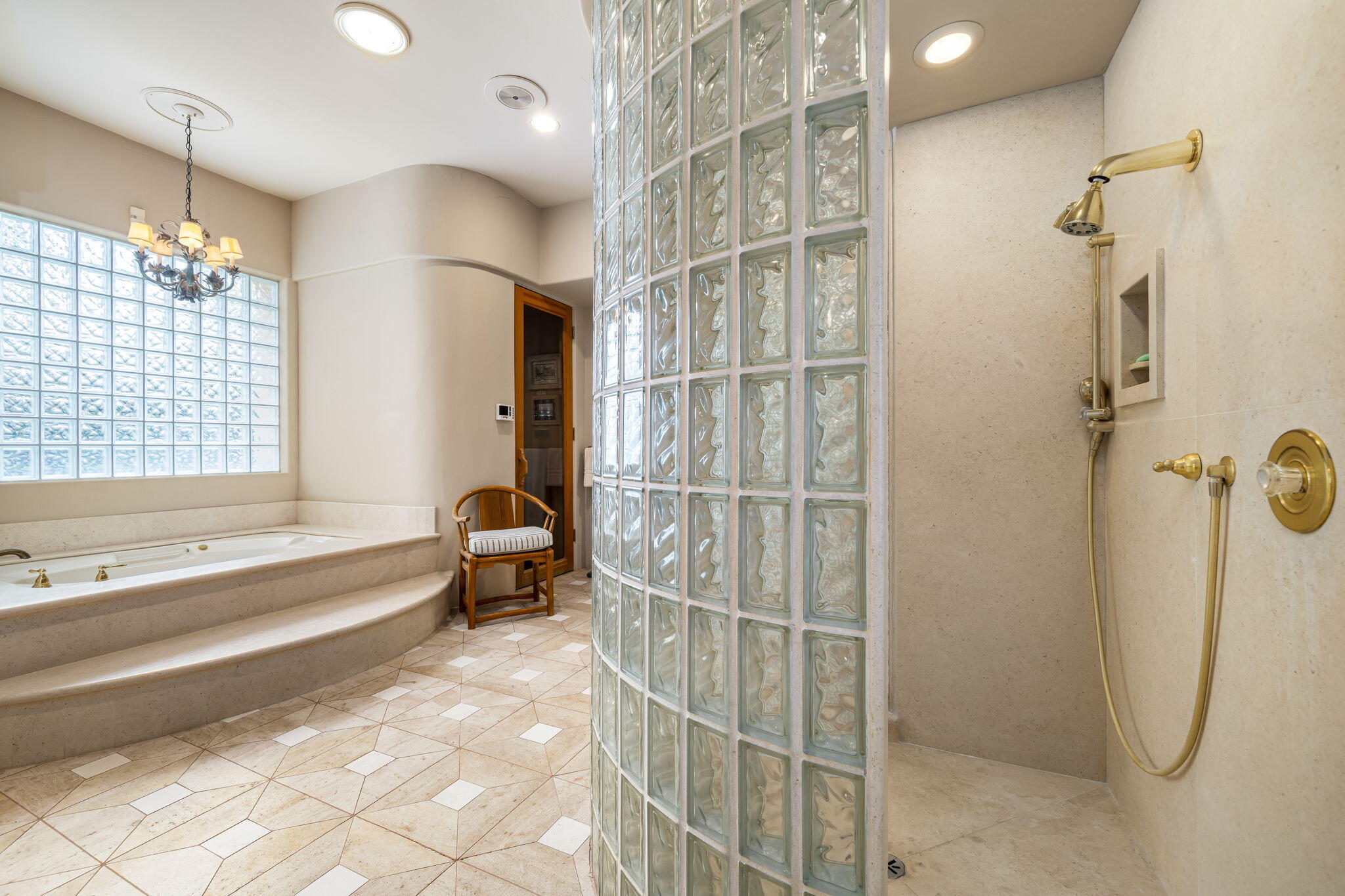 45595 Apache Road Indian Wells, CA 92210 - Photo 49 of 58 a bathroom with a bathtub and a shower