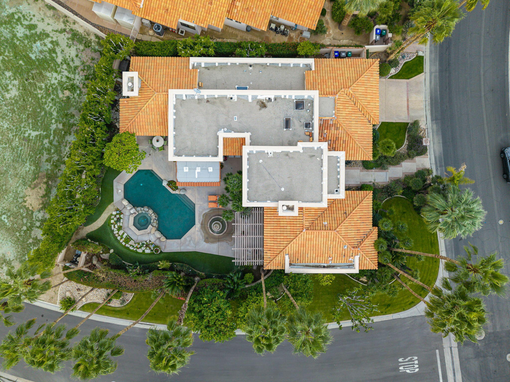 45595 Apache Road Indian Wells, CA 92210 - Photo 5 of 58 an aerial view of a house with a swimming pool