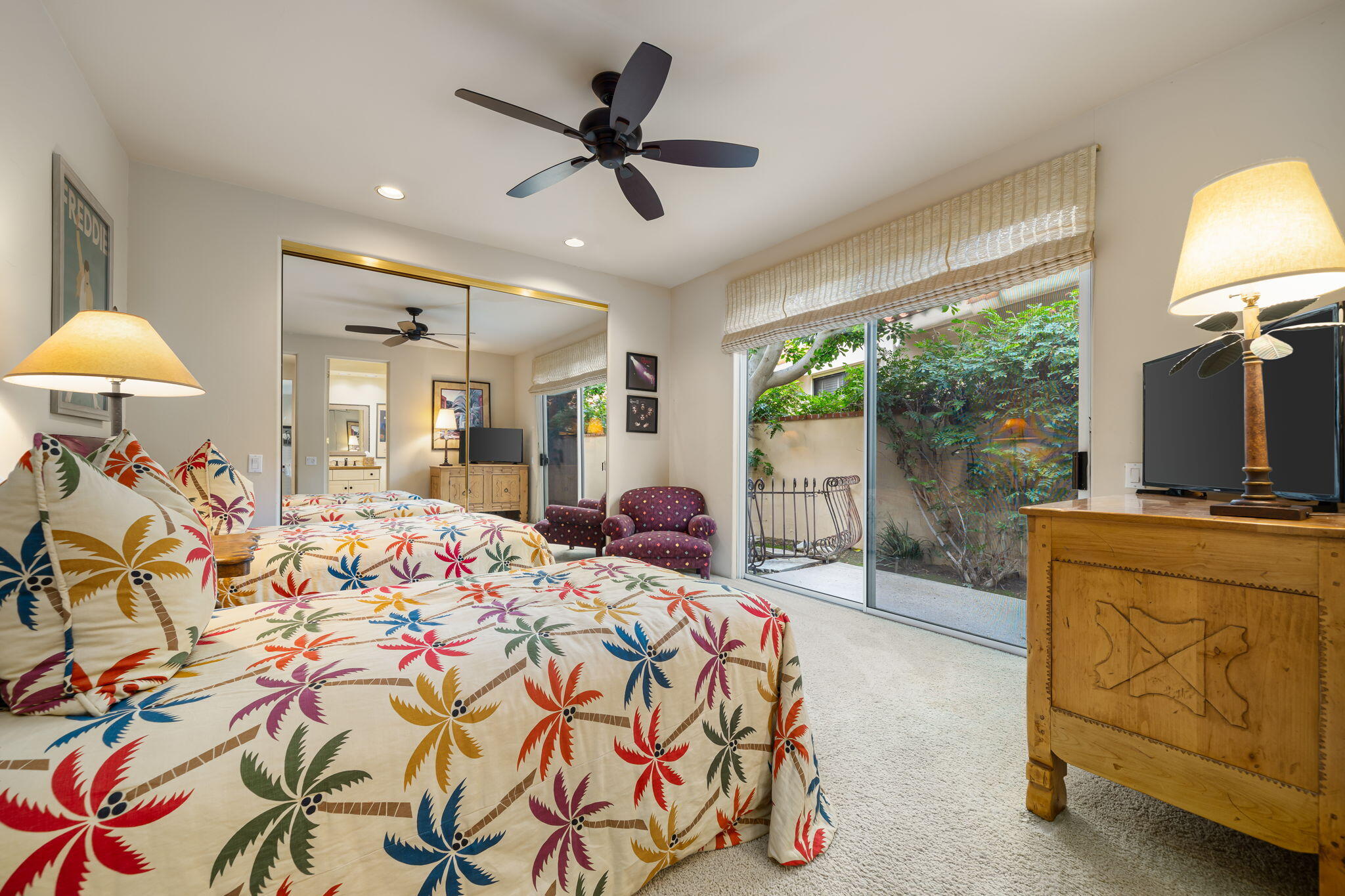 45595 Apache Road Indian Wells, CA 92210 - Photo 52 of 58 a bed room with a bed mirror and a window