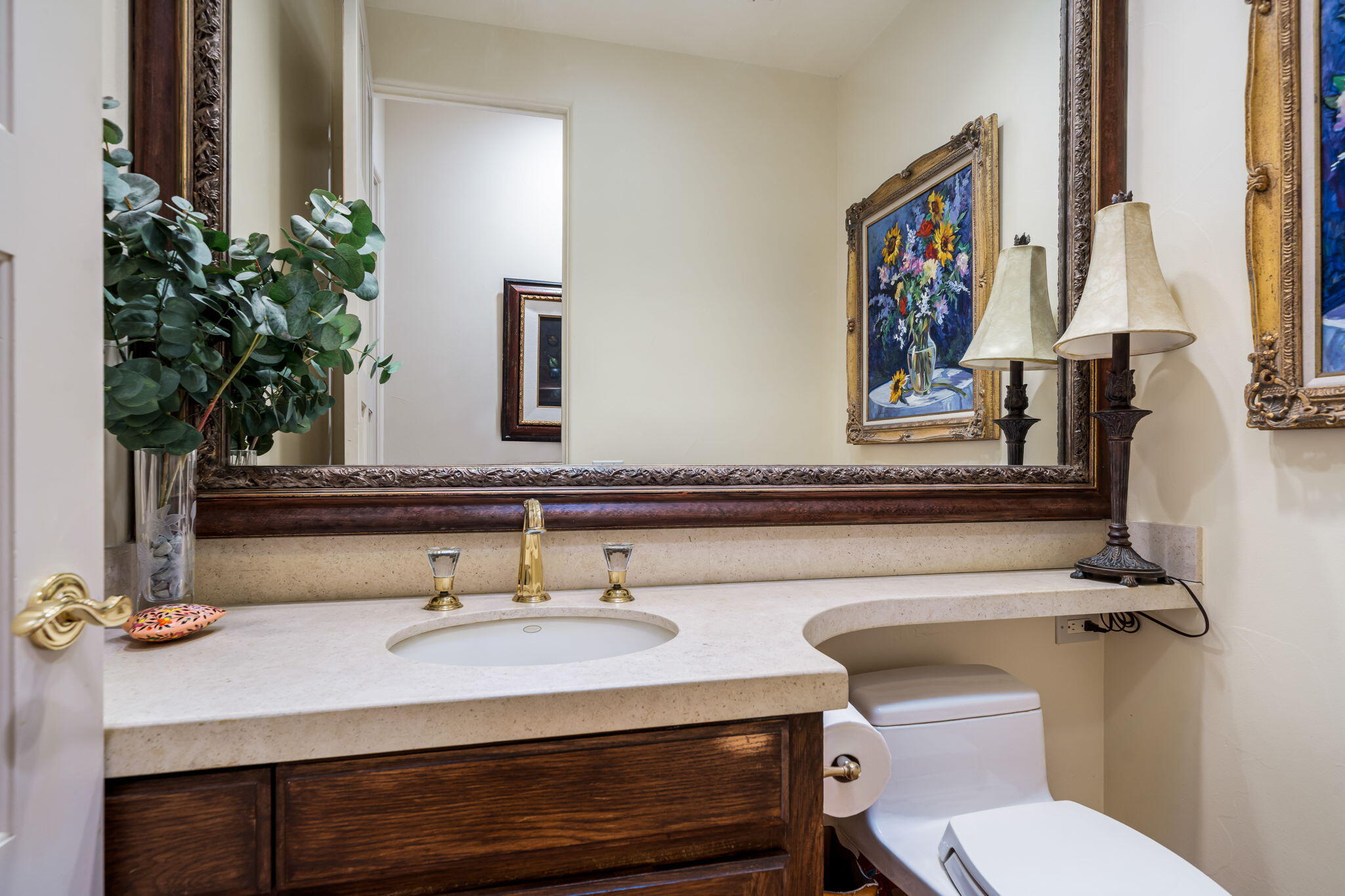 45595 Apache Road Indian Wells, CA 92210 - Photo 57 of 58 a bathroom with a toilet sink and mirror
