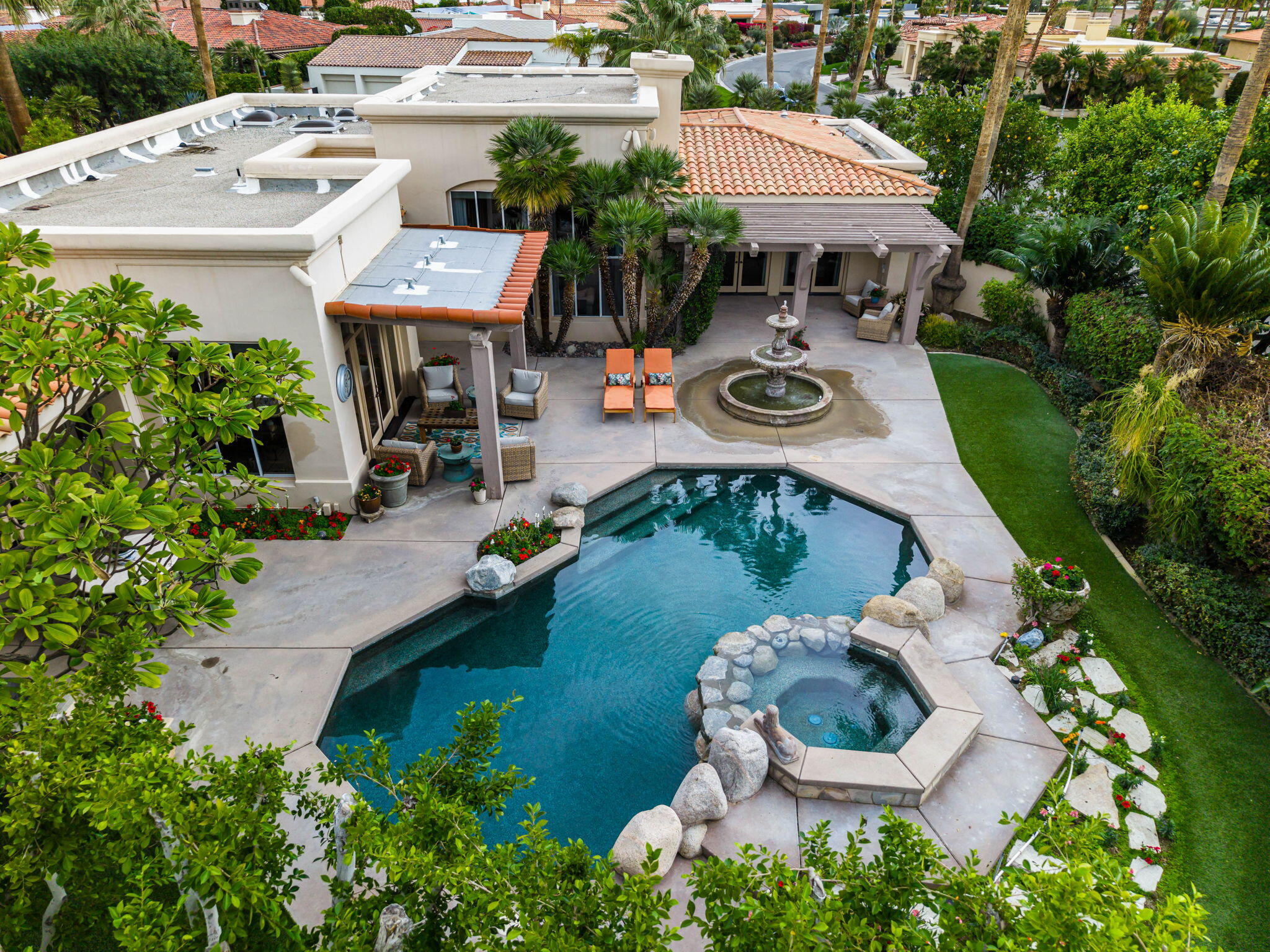 45595 Apache Road Indian Wells, CA 92210 - Photo 6 of 58 an aerial view of a house with garden space and street view
