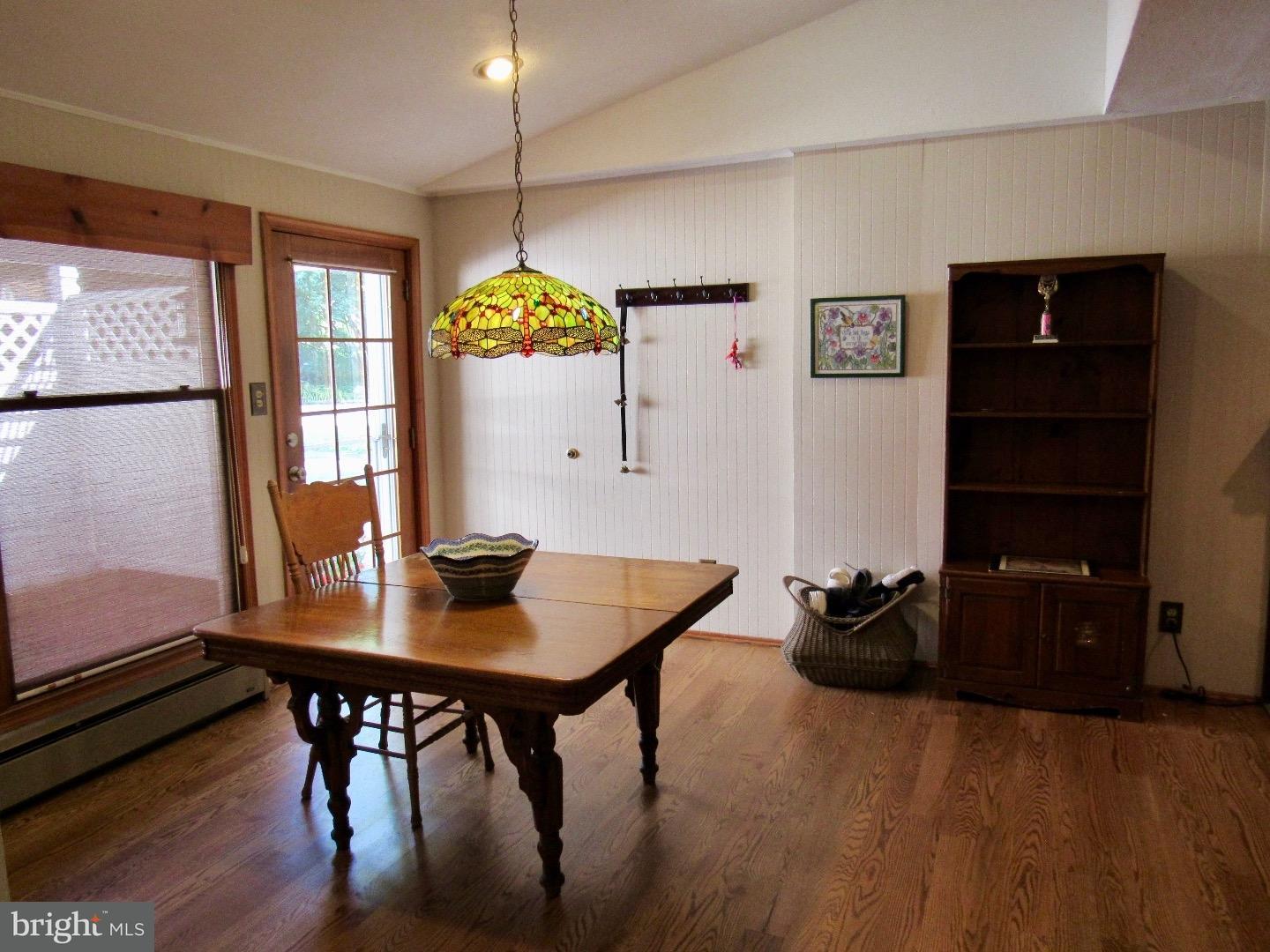 664 Parrish Road Swarthmore, PA 19081 - Photo 8 of 25 a view of a dining room with furniture and window