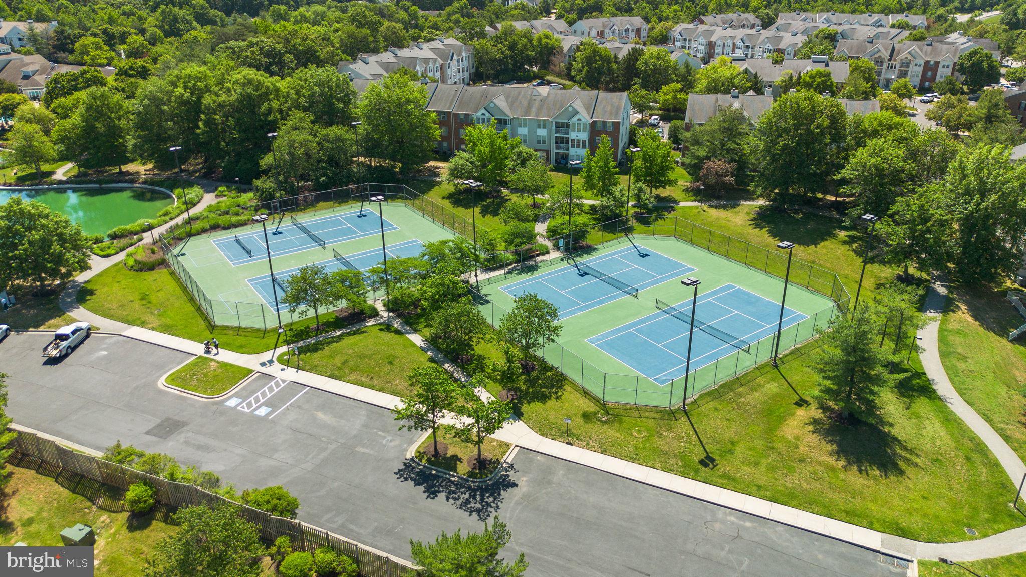 2444 Blue Spring Court, Unit 203 Odenton, MD 21113 - Photo 30 of 36 an aerial view of a swimming pool