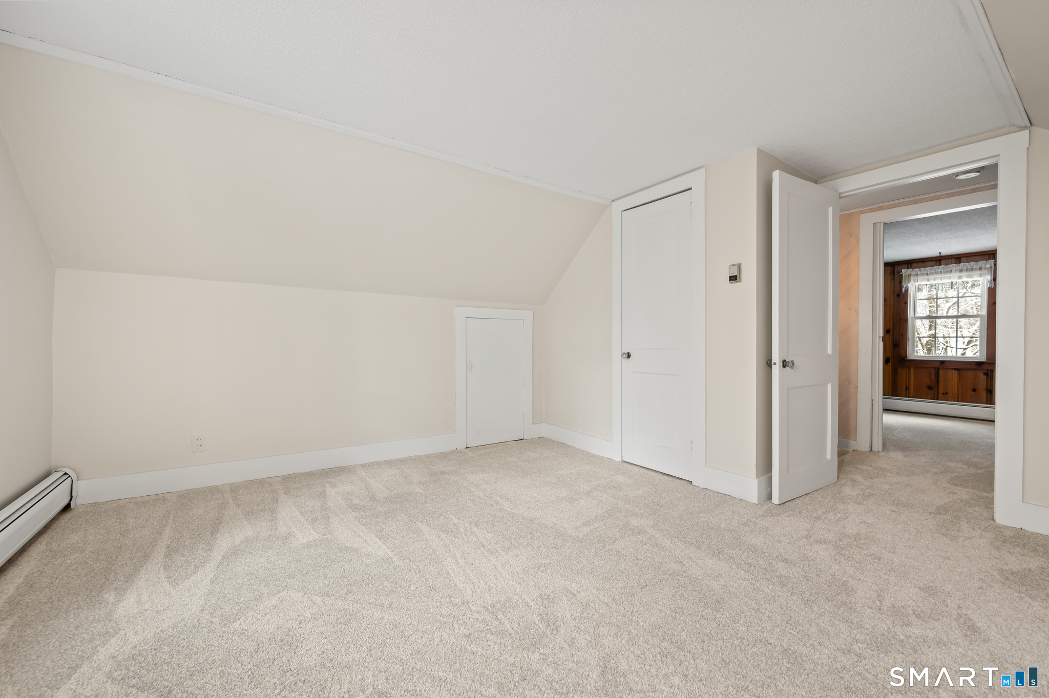 164 St John Street Manchester, CT 06040 - Photo 20 of 34 Bedroom 2 on the upper level looking towards bedroom 3.