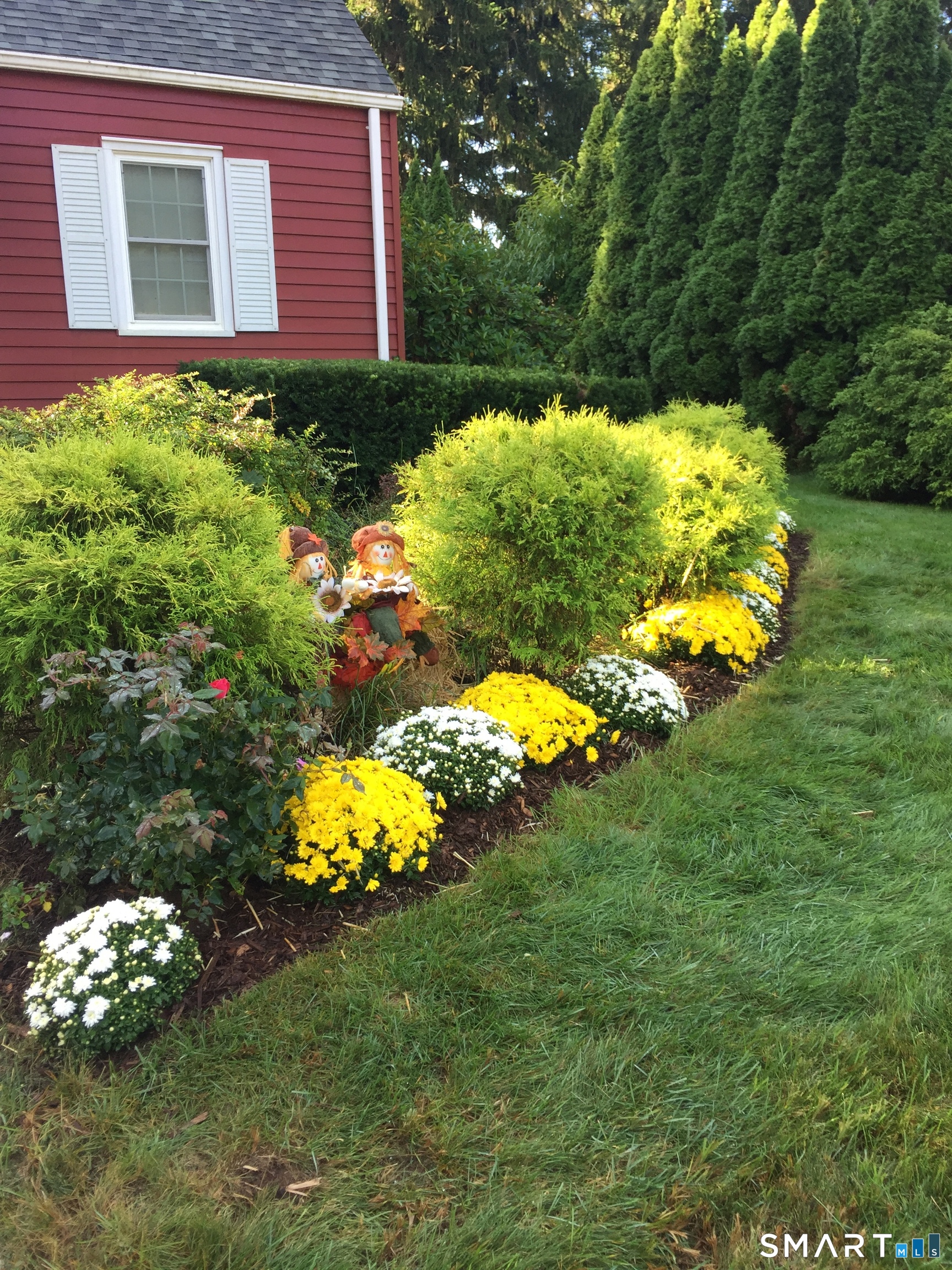 164 St John Street Manchester, CT 06040 - Photo 34 of 34 Gardens that surround the house in the spring, summer and fall.