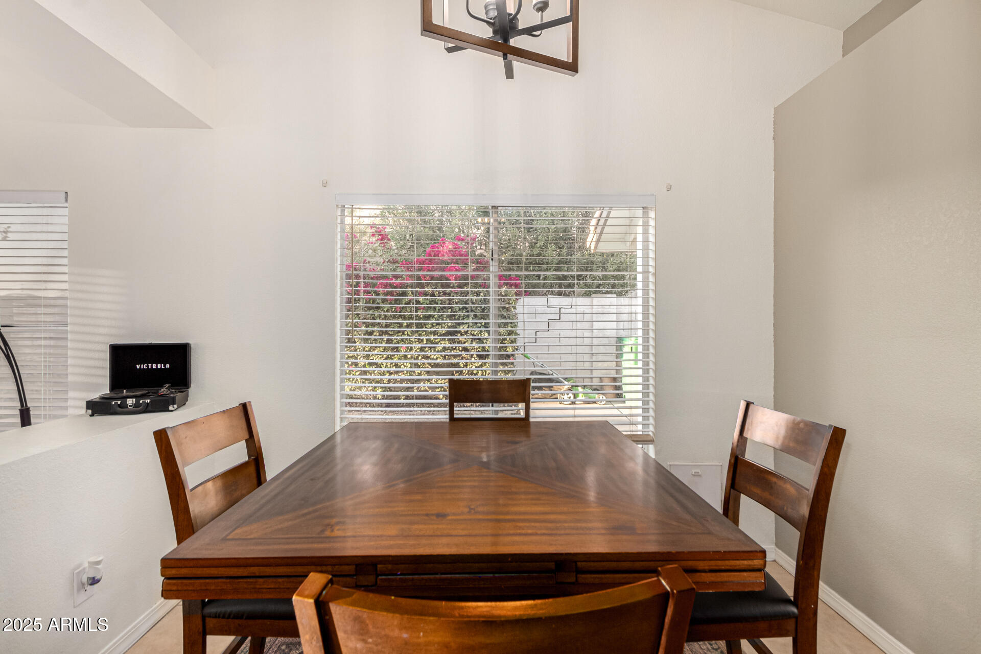 2646 North Robin Lane Mesa, AZ 85213 - Photo 16 of 45 a view of a dining room with furniture